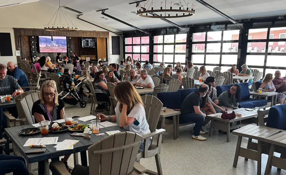 crowd playing music bingo brunch at barton orchards hosted by JB from hudson valley trivia co